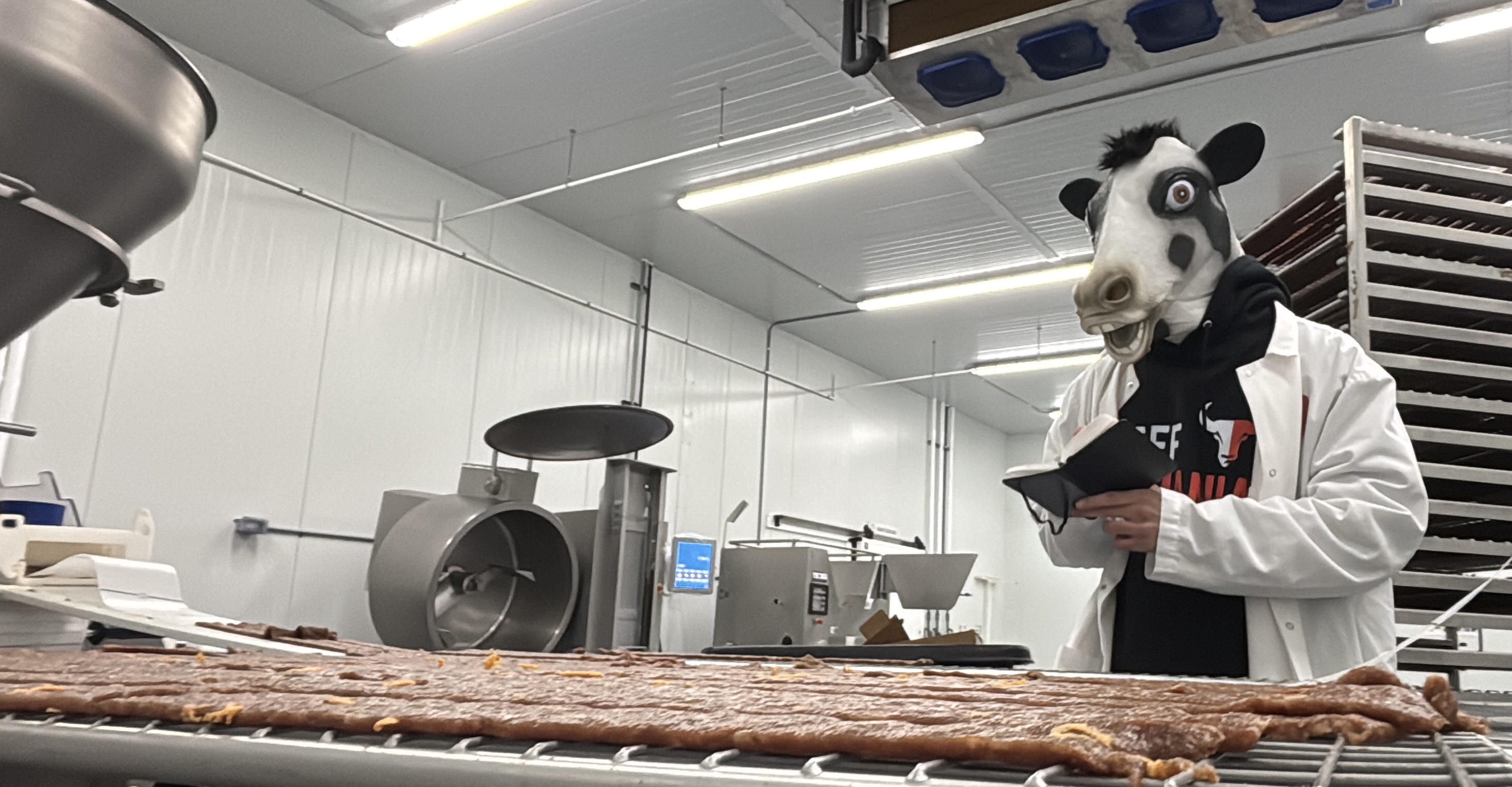 Beef Maniac Mascot in Processing Facility